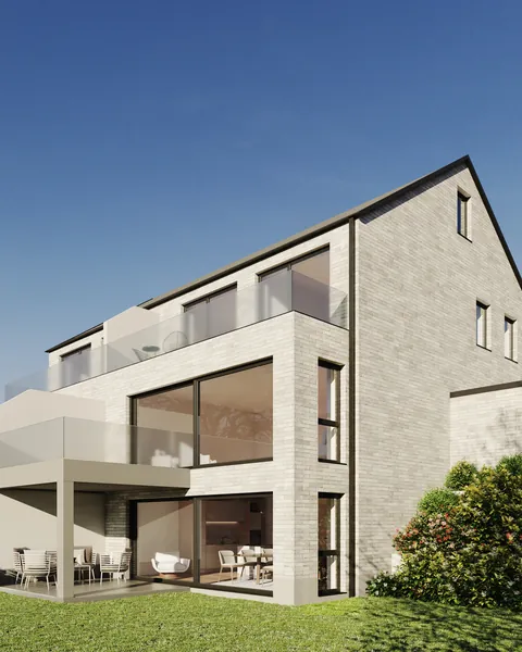 Doppelhaus in Heiligendorf mit heller Klinkerfassade und Dachterrasse
