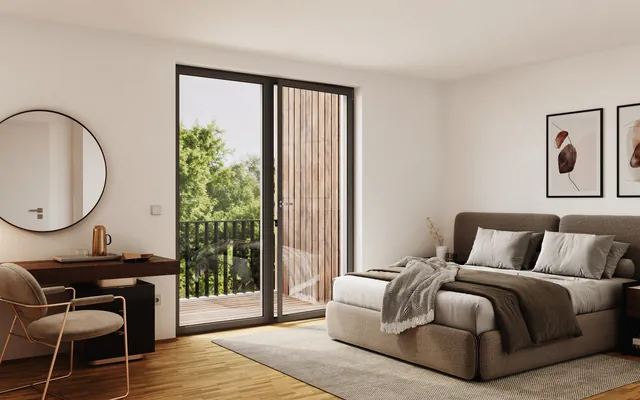 Schlafzimmer einer Wohnung in Wolfsburg mit Balkontür und Parkett